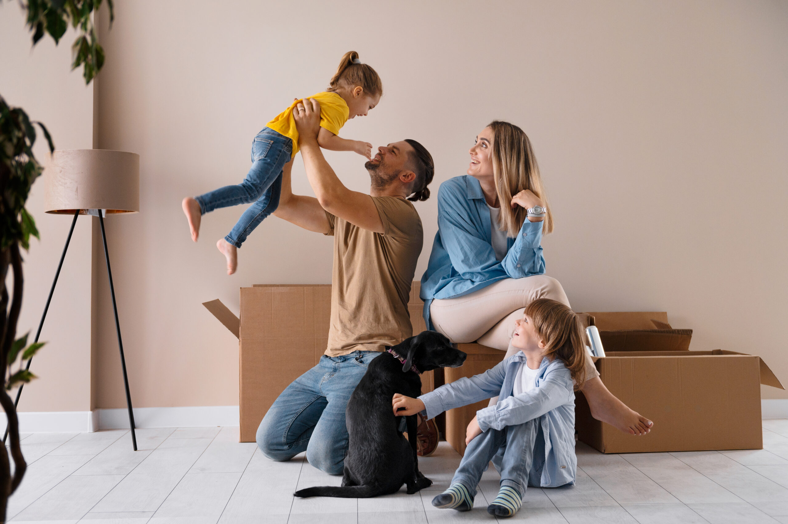 happy-family-with-dog-moving-new-home